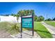 Community sign for Penthouse Groves A, B, C, D, E and address 1655 at 1655 S Highland Ave # B118, Clearwater, FL 33756