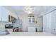 Bright kitchen equipped with stainless steel appliances and white cabinets at 1655 S Highland Ave # B118, Clearwater, FL 33756