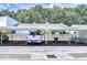 Exterior shot of long covered parking with residences nearby and well maintained at 1655 S Highland Ave # B118, Clearwater, FL 33756