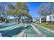 Exterior view of shuffleboard courts with benches and well maintained landscaping at 1655 S Highland Ave # B118, Clearwater, FL 33756