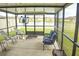 Enjoy outdoor living in this screened lanai with lake views at 16623 Carlton Pond St, Wimauma, FL 33598