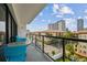 Balcony with a seating area offering views of the city and nearby rooftops at 199 Dali Blvd # 607, St Petersburg, FL 33701