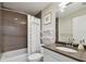 Bathroom with modern fixtures, shower, vanity, and neutral color scheme at 199 Dali Blvd # 607, St Petersburg, FL 33701