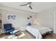 Tranquil bedroom with hardwood floors, accent decor, and ample natural light, offering a relaxing retreat at 199 Dali Blvd # 607, St Petersburg, FL 33701