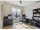 Well-lit bedroom with expansive windows, desk, and sleek decor, creating a functional and inviting space at 199 Dali Blvd # 607, St Petersburg, FL 33701