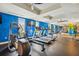 Gym featuring exercise equipment, blue accent wall and natural light at 199 Dali Blvd # 607, St Petersburg, FL 33701