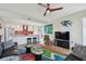 Modern living room featuring an open layout, stylish furnishings, and a colorful rug at 199 Dali Blvd # 607, St Petersburg, FL 33701