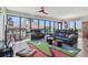Stylish living room with expansive windows offering cityscape views and comfortable seating area at 199 Dali Blvd # 607, St Petersburg, FL 33701