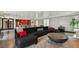 Lounge area featuring a large, comfortable sectional sofa and decorative pillows at 199 Dali Blvd # 607, St Petersburg, FL 33701