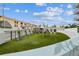 Rooftop deck area features an artificial turf lawn and decorative sculptures at 199 Dali Blvd # 607, St Petersburg, FL 33701