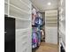 Spacious walk-in closet featuring custom shelving and drawers at 199 Dali Blvd # 607, St Petersburg, FL 33701