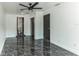 Bright bedroom with marble floors, white walls, and ample closet space at 2010 4Th W Ave, Palmetto, FL 34221