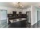 Modern kitchen featuring stainless steel appliances and a granite island at 2010 4Th W Ave, Palmetto, FL 34221