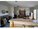 Inviting living room with a ceiling fan, a comfortable sofa, and ample space for relaxation at 205 Portia S St, Nokomis, FL 34275