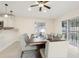 Dining room featuring modern decor and sliding glass doors to the outside at 212 W Humphrey St, Tampa, FL 33604