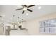 Bright and open-concept layout featuring an adjacent kitchen and living area at 212 W Humphrey St, Tampa, FL 33604