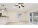 Open living area with bright natural light and outdoor access at 212 W Humphrey St, Tampa, FL 33604