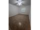 A clean, simple bedroom with a ceiling fan offers a comfortable living space at 226 Thorn Tree Pl # 226, Brandon, FL 33510