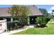 Charming pool house with classic design and lush greenery at 230 N Bayshore Blvd # 103, Clearwater, FL 33759