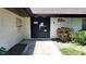 The front doors of this multi-Gathering dwelling are solid black and sturdy at 230 N Bayshore Blvd # 103, Clearwater, FL 33759