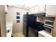Functional kitchen with appliances and classic white cabinetry at 230 N Bayshore Blvd # 103, Clearwater, FL 33759