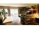 Cozy living room with balcony, comfortable seating, and ample natural light at 230 N Bayshore Blvd # 103, Clearwater, FL 33759