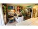 Comfortable living room space with couch, decor, guitar and street name art at 230 N Bayshore Blvd # 103, Clearwater, FL 33759