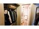 Walk-in closet leads to bathroom with sink and toilet at 230 N Bayshore Blvd # 103, Clearwater, FL 33759