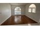 Dining room with wood floors, natural light, and neutral decor for stylish and comfortable meals at 2635 Jarvis Cir, Palm Harbor, FL 34683