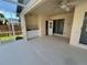 The lanai offers a convenient outdoor kitchen, enhancing the outdoor experience at 2635 Jarvis Cir, Palm Harbor, FL 34683