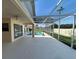 Relaxing screened-in lanai with an inviting pool perfect for enjoying outdoor living at 2635 Jarvis Cir, Palm Harbor, FL 34683