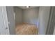 Cozy bedroom with wood floors and neutral gray walls, filled with natural light at 2910 15Th Ave S, St Petersburg, FL 33712