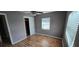 This bedroom features neutral walls, ceiling fan and a closet for ample storage at 2910 15Th Ave S, St Petersburg, FL 33712