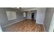 Spacious living room featuring sleek wood floors and an open layout at 2910 15Th Ave S, St Petersburg, FL 33712