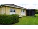 Charming home exterior with lush landscaping and a screened-in lanai, perfect for enjoying the outdoors at 29435 Snap Hook Dr, San Antonio, FL 33576