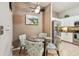 Efficient eat-in kitchen has modern appliances, ample counter space, and cozy seating for casual meals at 3484 Primrose Way, Palm Harbor, FL 34683