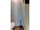Compact bathroom with a tiled shower stall and toilet at 38320 14Th Ave, Zephyrhills, FL 33542