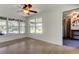 Bright living room with lots of natural light and view of front yard at 38320 14Th Ave, Zephyrhills, FL 33542