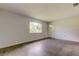 Bright living room featuring a large window and neutral walls, perfect for any decor at 38320 14Th Ave, Zephyrhills, FL 33542