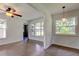 Bright living room featuring large windows and view of backyard at 38320 14Th Ave, Zephyrhills, FL 33542