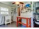 Utility room with utility sink, work table, and tool storage at 38320 14Th Ave, Zephyrhills, FL 33542