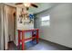 Utility room with work table, tool storage, and shower stall at 38320 14Th Ave, Zephyrhills, FL 33542