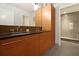 Modern bathroom featuring double vanity, wood cabinets, and a walk-in shower at 400 4Th S Ave # 301, St Petersburg, FL 33701