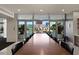 Conference room with a long table, sleek chairs, and beautiful city views at 400 4Th S Ave # 301, St Petersburg, FL 33701