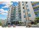 Upscale condo building with multiple floors, spacious balconies and manicured landscaping at 400 4Th S Ave # 301, St Petersburg, FL 33701