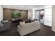 Stylish common area featuring modern furniture and a large TV for relaxation at 400 4Th S Ave # 301, St Petersburg, FL 33701