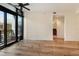 Open living room with hardwood flooring and access to a private balcony at 400 4Th S Ave # 301, St Petersburg, FL 33701