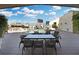 Picturesque poolside view offering lounge chairs, tables and city views at 400 4Th S Ave # 301, St Petersburg, FL 33701