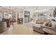 Inviting living space featuring tile floors, stylish decor, and comfortable furnishings at 4020 Cottage Hill Ave, Parrish, FL 34219