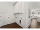 Laundry room with white cabinets and hookups at 406 E Selma Ave, Tampa, FL 33603